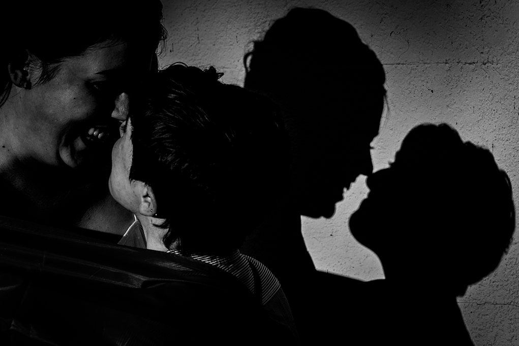 Silhouette portraits of same-sex couple during their Great Falls engagement photos by Potok's world Photography, engagement photographers in Maryland.