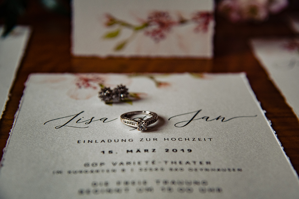 Delicate cherry blossom print on wedding invitation by DC Wedding Photographers of Potok's World Photography