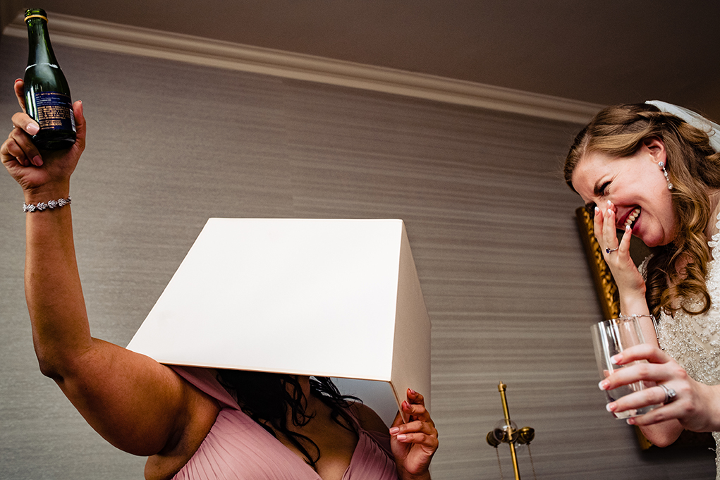 Funny moment by bridesmaid in the bridal suite of the Omni Shoreham DC wedding by DC wedding photographers Potok's World Photography