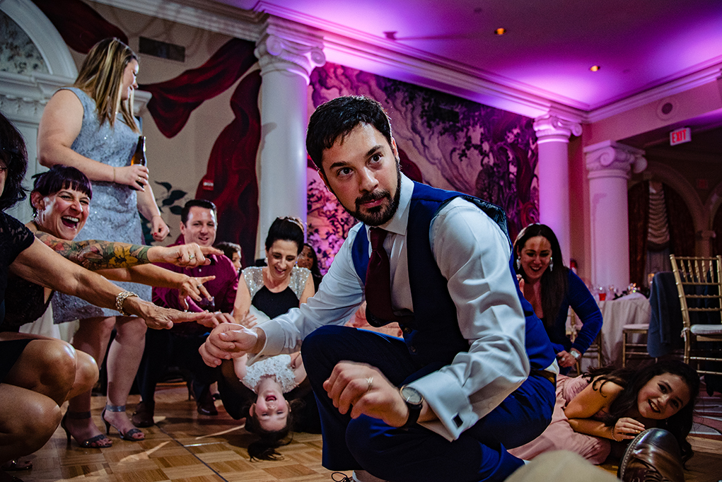 Groom and guests dancing to the song Shout at the Omni Shoreham DC wedding by DC wedding photographers Potok's World Photography