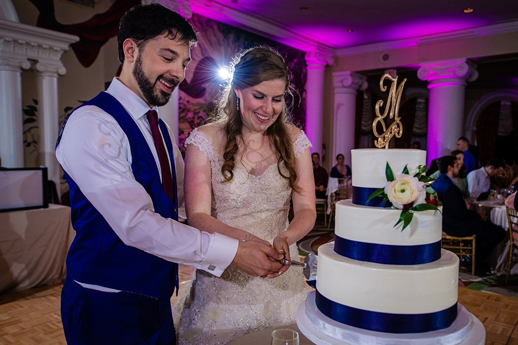 Bride and groom cake cutting at the Omni Shoreham DC wedding by DC wedding photographers Potok's World Photography