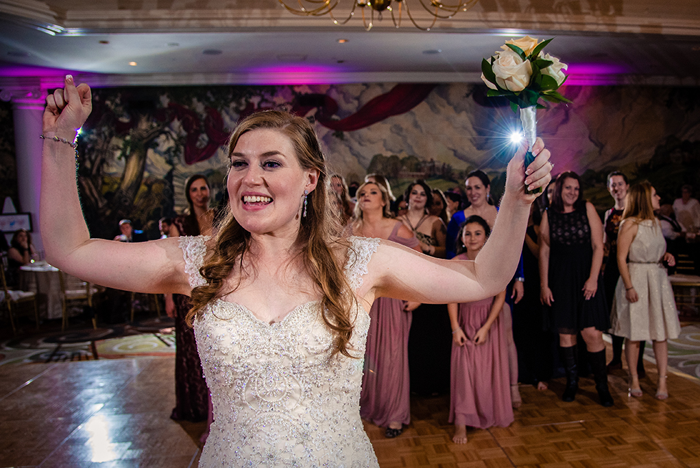 Bouquet toss by the bride at the Omni Shoreham DC wedding by DC wedding photographers Potok's World Photography