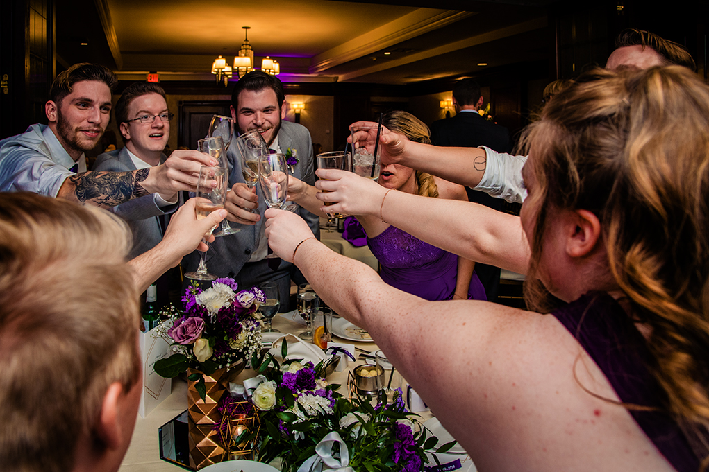 Bridal party toast at City Club of Washington reception by DC wedding photographers Anji and Pete Martin of Potok's World Photography 