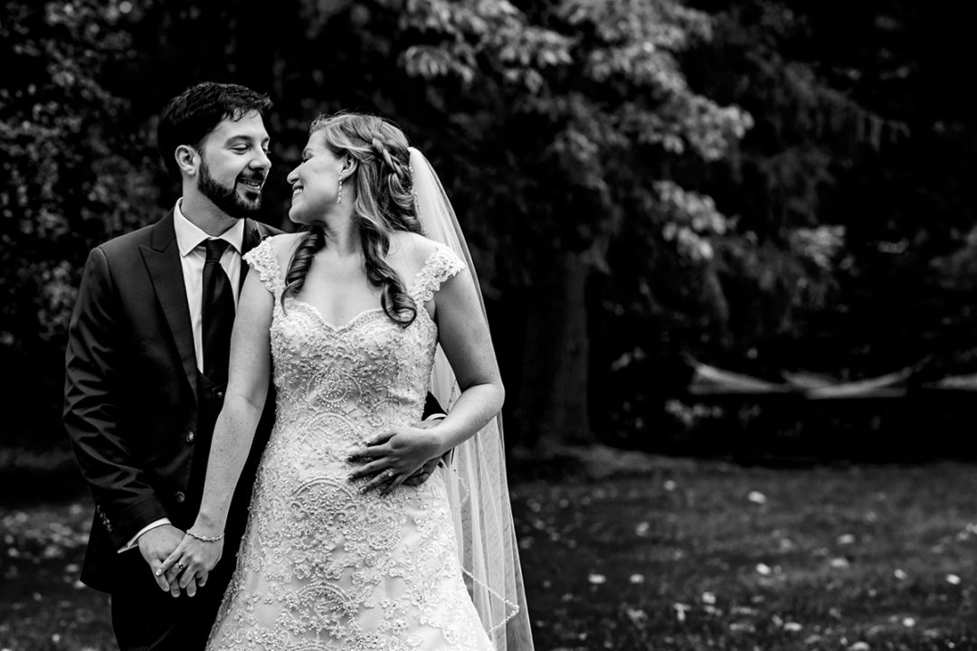  Things to include in your wedding day timeline are bride and groom portraits. This couple took their photos outdoors at the Omni Shoreham Hotel in downtown DC by Potok’s World Photography.