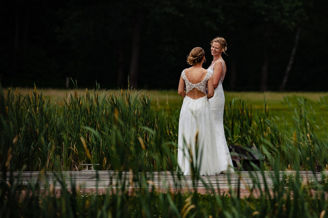 Weddings during coronavirus: Small intimate same elopement with two brides in wedding dresses by Washington DC wedding photographers of Potok's World Photography