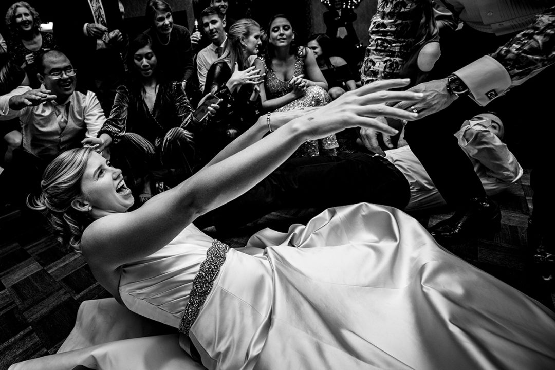 Bride dancing to shout on the dance floor at Carlyle Club Alexandria by DC wedding photographers Potok's World Photography 