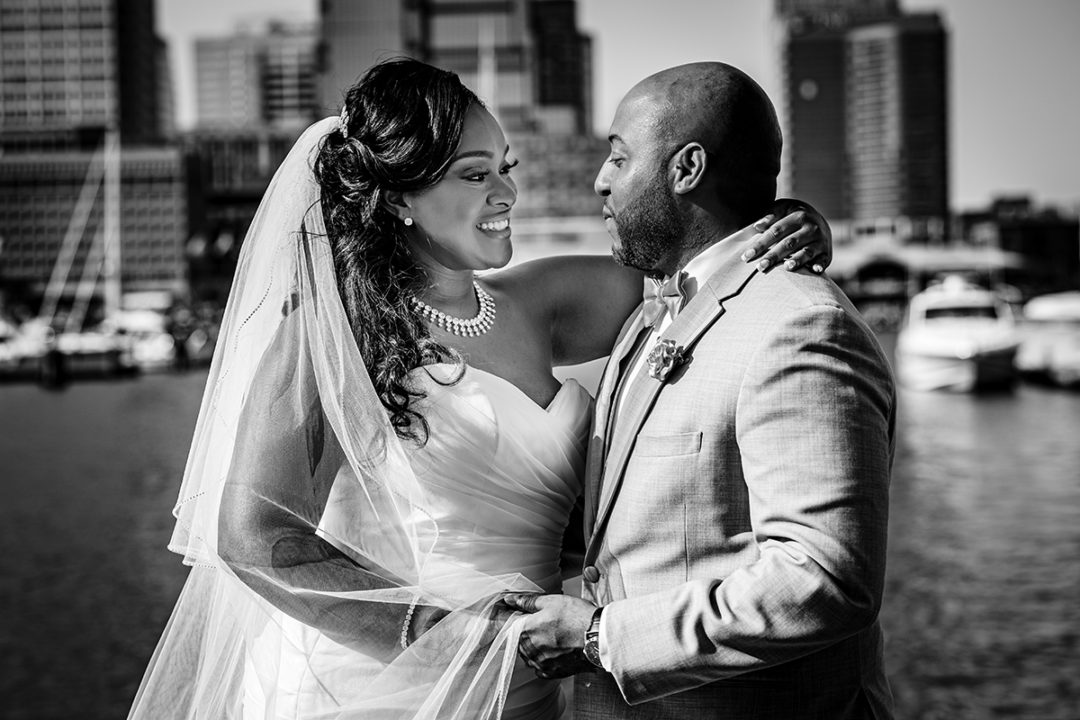 Wedding day timeline: Bride and groom portraits at Baltimore's Inner Harbor by DC wedding photographer Potok's World Photography