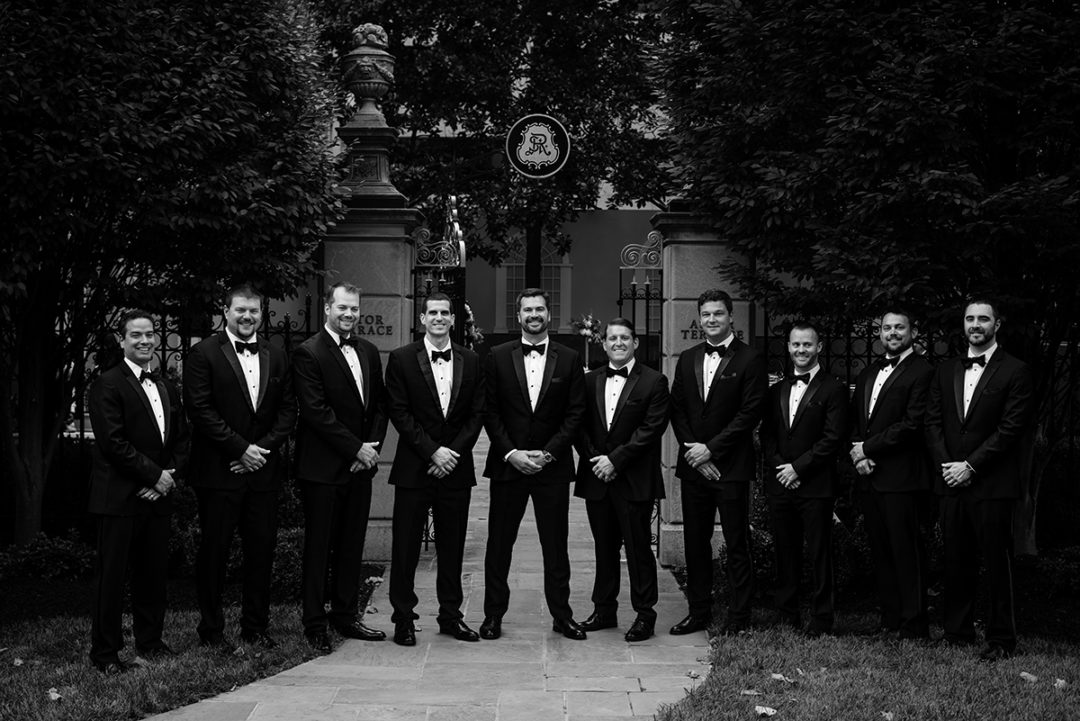 Groom with groomsmen in front of the Astor Terrace at the St. Regis DC wedding after the ceremony by photographers Potok's World Photography