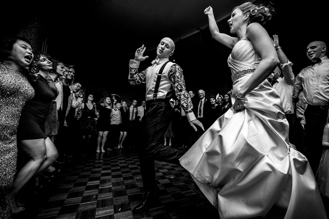 Bride and groom dancing during reception at the Carlyle Club in Alexandria, VA by DC wedding photographers Potok's World Photography