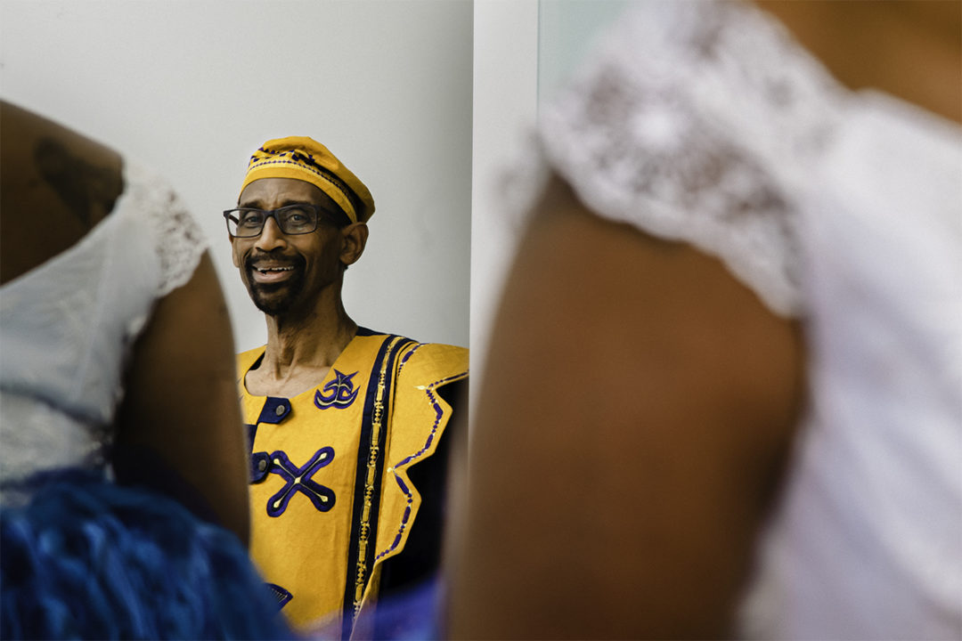 Ghanaian bride's first look with dad during a Washington DC micro wedding at Fathom Gallery by Potok's World Photography