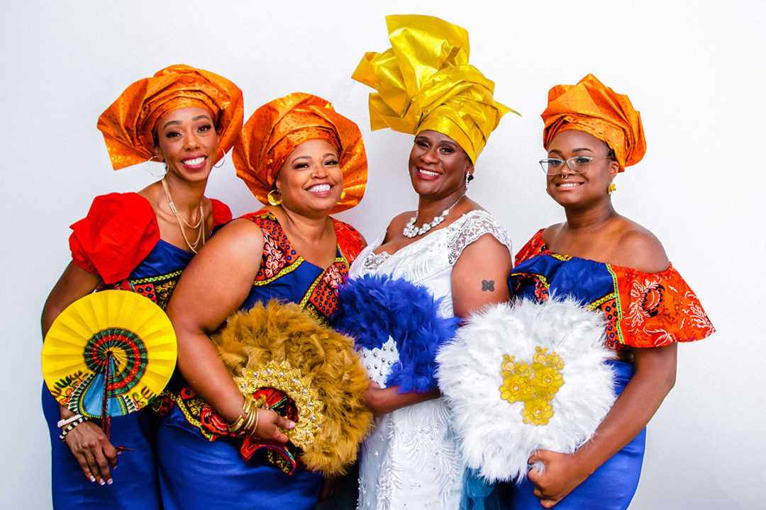 Ghanaian bride with bridesmaids in traditional dresses during a Washington DC micro wedding at Fathom Gallery by Potok's World Photography