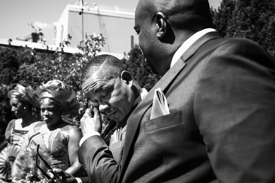  Groom tearing up watching his bride walk up the aisle during Washington DC micro wedding at Fathom Gallery by Potok's World Photography