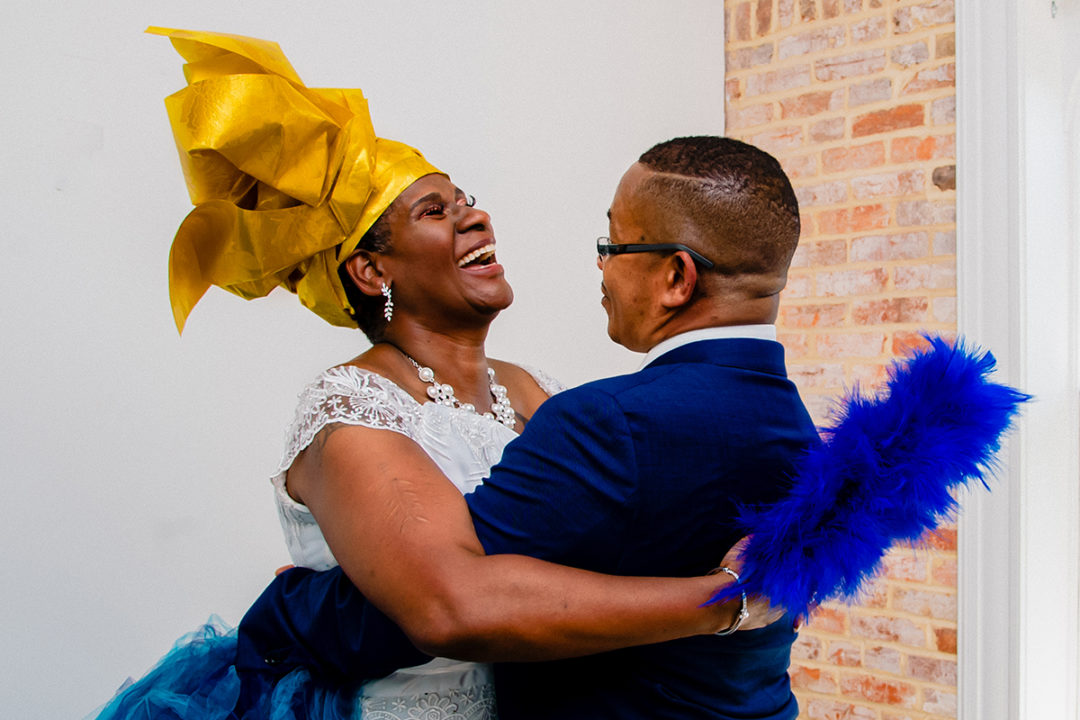  Couple's portraits of ghanaian bride and her groom during a Washington DC micro wedding at Fathom Gallery by photographers Potok's World Photography