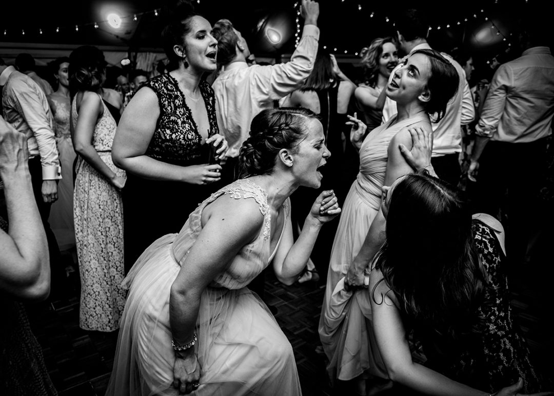  Documentary wedding photography in Washington DC of bridesmaids dancing during reception at 101 Constitution by Anji Martin of Potok’s World Photography, DC wedding photographer