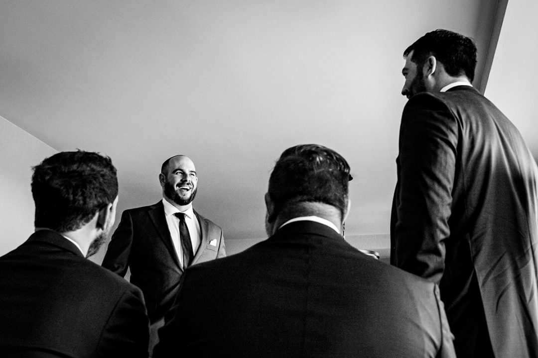 Groom and groomsmen getting ready at Landsdowne Spa and Resort in Leesburg before the Vanish Brewery wedding by DC wedding photographer Pete Martin of Potok's World Photography