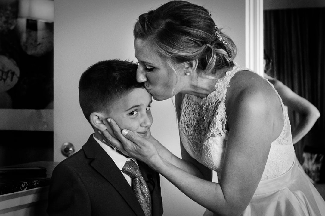 First look bride and son at Landsdowne Spa and Resort in Leesburg before Vanish Brewery wedding by DC wedding photographer Anji Martin of Potok's World Photography