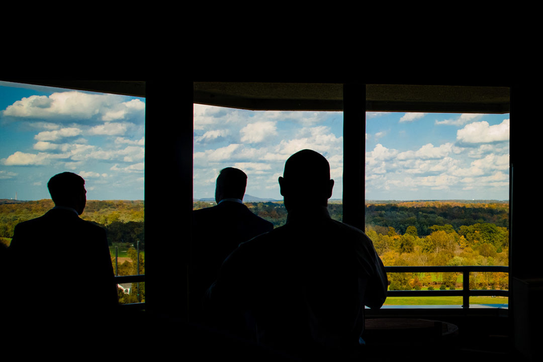 Groom and groomsmen getting ready at Landsdowne Spa and Resort in Leesburg before the Vanish Brewery wedding by DC wedding photographer Pete Martin of Potok's World Photography