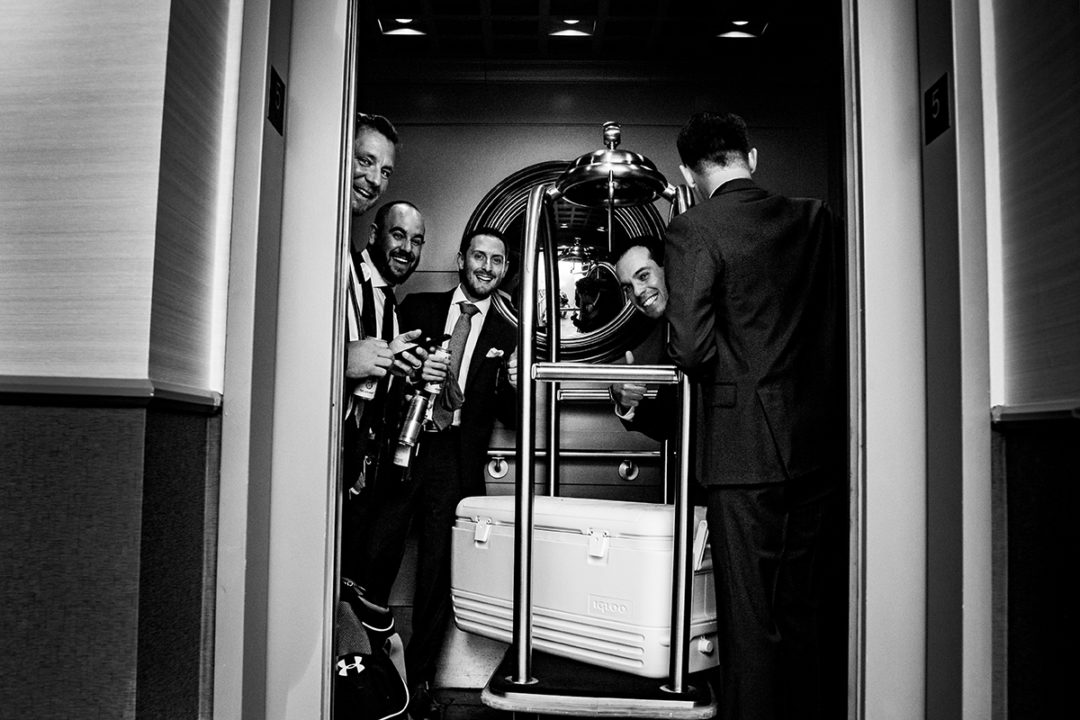 Groom and groomsmen getting ready at Landsdowne Spa and Resort in Leesburg before the Vanish Brewery wedding by DC wedding photographer Pete Martin of Potok's World Photography