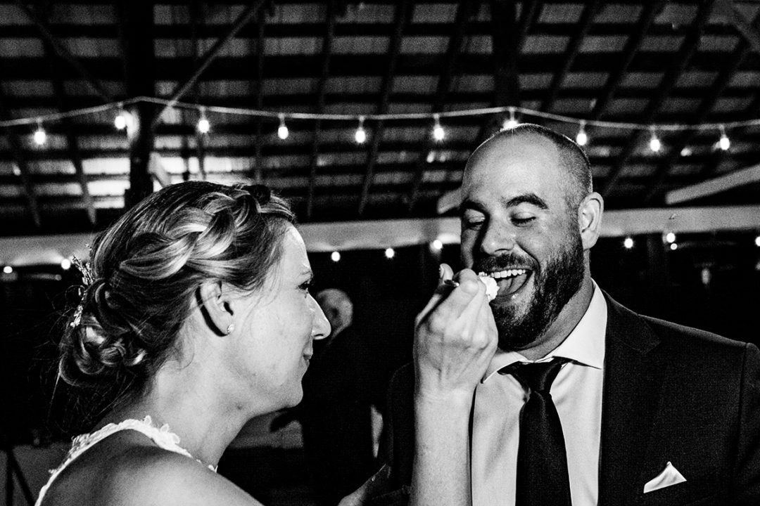 Cake cutting at Vanish Brewery wedding in Virginia by DC wedding photographers of Potok's World Photographers