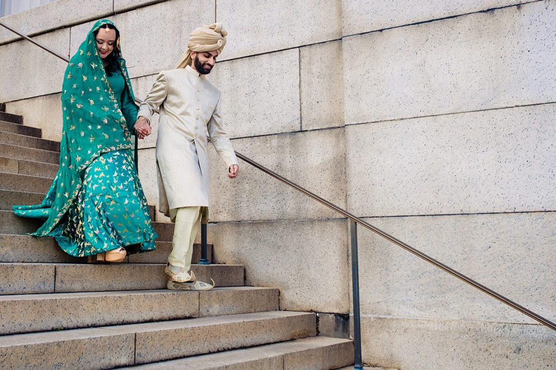 Creative south-asian bride and groom portraits at the Lincoln Memorial by DC wedding photographer of Potok's World Photography