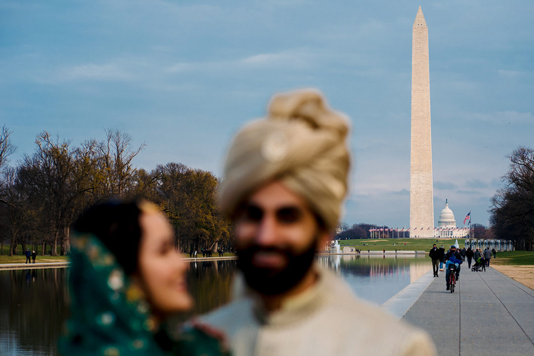 Creative south-asian bride and groom portraits at the reflecting pool by DC wedding photographer of Potok's World Photography