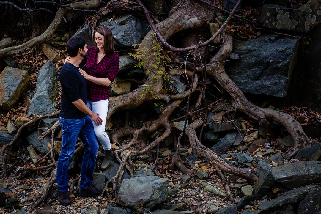 Hiking engagement photos at Scott's Run Nature Preserve in Northern Virginia by DC wedding photographers of Potok's World Photography