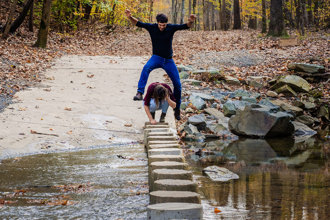Hiking engagement photos at Scott's Run Nature Preserve in Northern Virginia by DC wedding photographers of Potok's World Photography