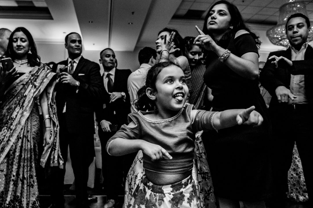 Fun indian wedding reception in Virginia dance floor moments by DC wedding photographers of Potok's World Photography