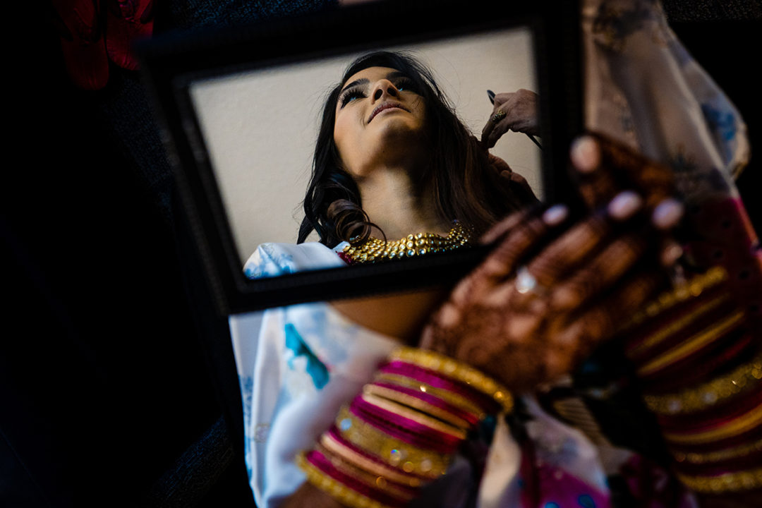 Indian bride getting ready before wedding ceremony at the Winery at Bull Run Virginia by Potok's World Photography