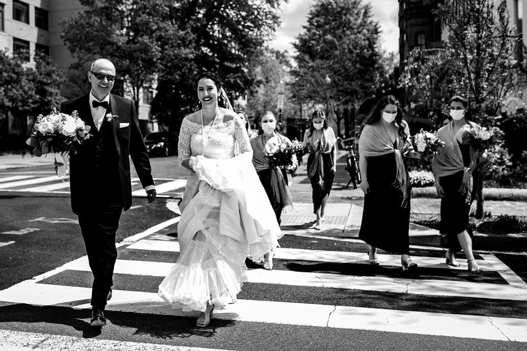 Bride, her dad and bridal party walking to church ceremony in Capitol Hill Washington DC by Potok's World Photography