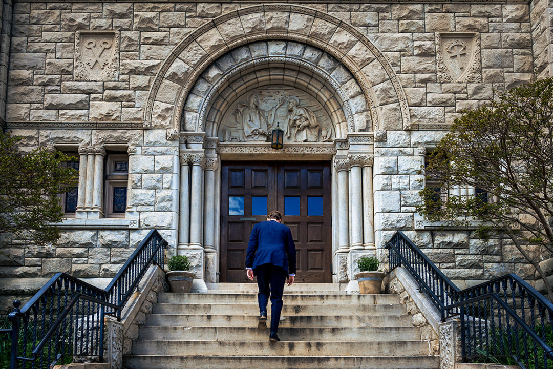 Groom walking in to church for wedding ceremony at Capitol Hill DC by Potok's World Photography