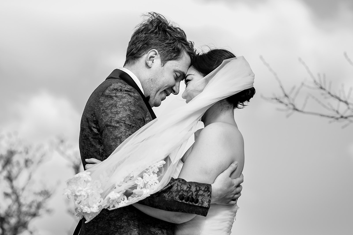 Black and white wedding portrait of the bride and groom at the Constitution Gardens in Washington DC by Potok's World Photography