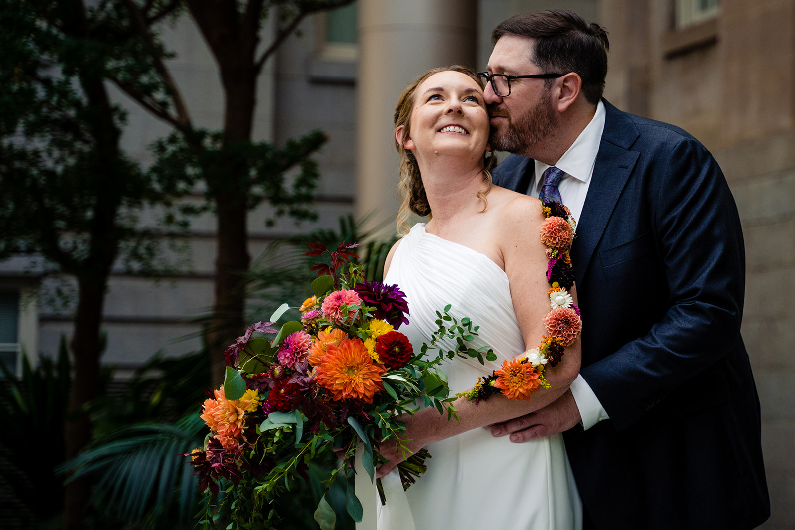 Bride and groom couple's portraits in the Kogod Courtyard, in the National Portrait Gallery and American Art Museum in the District by DC wedding photographers of Potok's World Photography