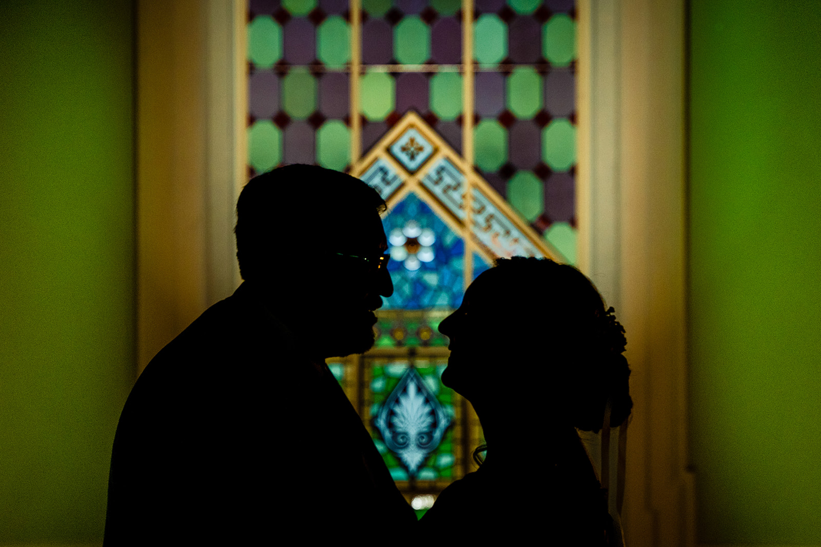 Bride and groom couple's portrait silhouette at the American Art Museum in the Nation's Capital by Washington DC wedding photographer of Potok's World Photography