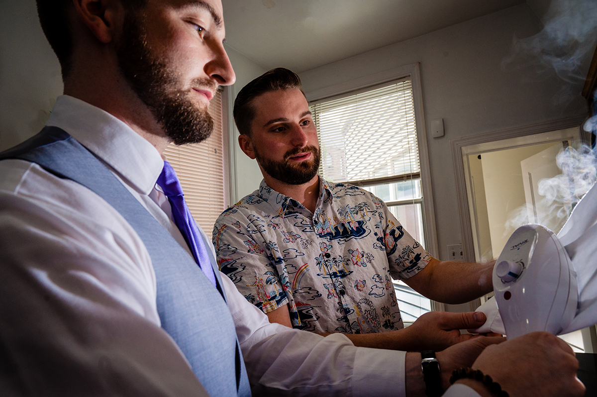 Groom getting ready with his groomsmen before wedding ceremony in Washington DC by Potok's World Photography