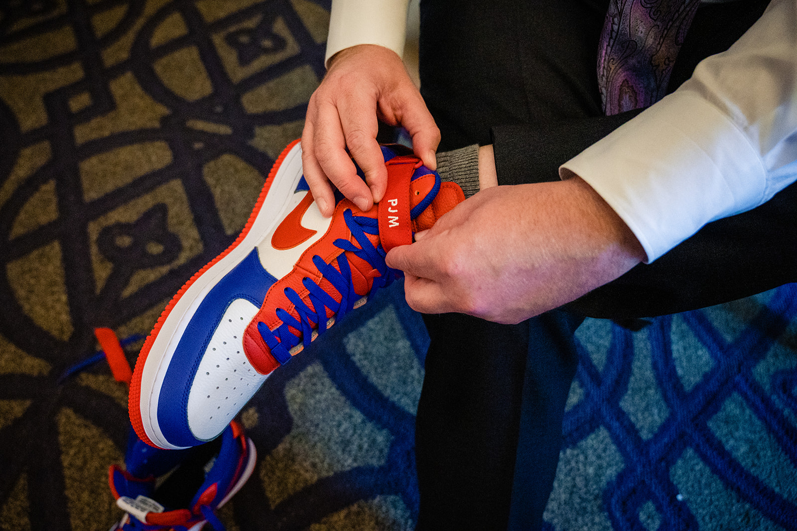 Groom getting ready at Hotel Monaco in Washington DC before the wedding ceremony by Potok's World Photography