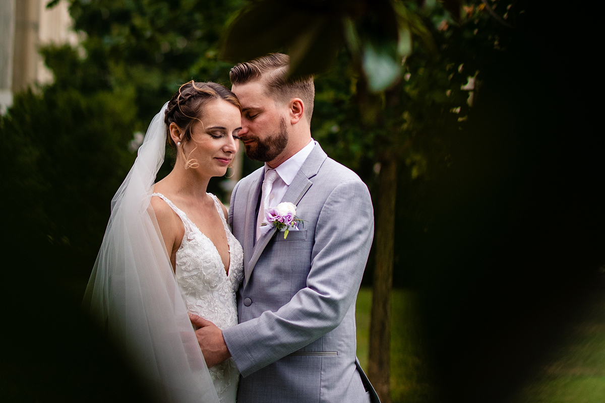 Post wedding ceremony bride and groom couple's portraits in front of the US Capitol in Washington DC by Potok's World Photography