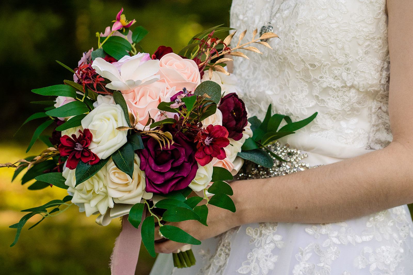 Photos of a Fredericksburg VA bride getting into her wedding dress by Potok's World Photography