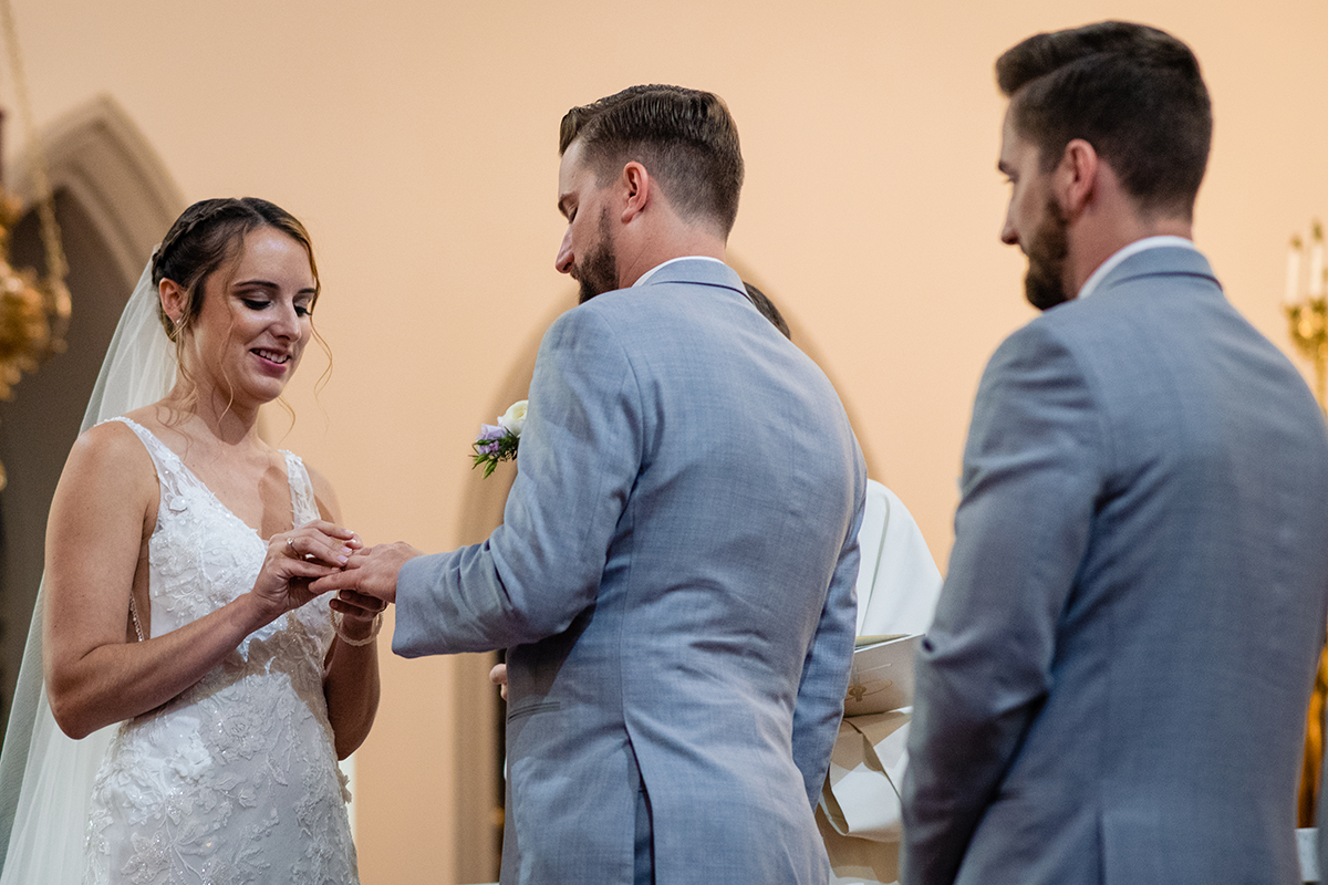 St. Josephs on Capitol Hill wedding ceremony ring exchange by Potok's World Photography